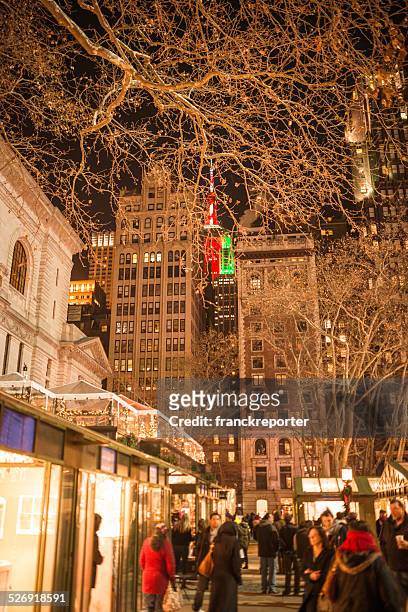 christmas decoration in bryant park - bryant park christmas tree lighting stock pictures, royalty-free photos & images