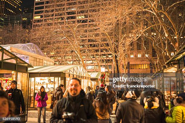 christmas decoration in bryant park - bryant park christmas tree lighting stock pictures, royalty-free photos & images