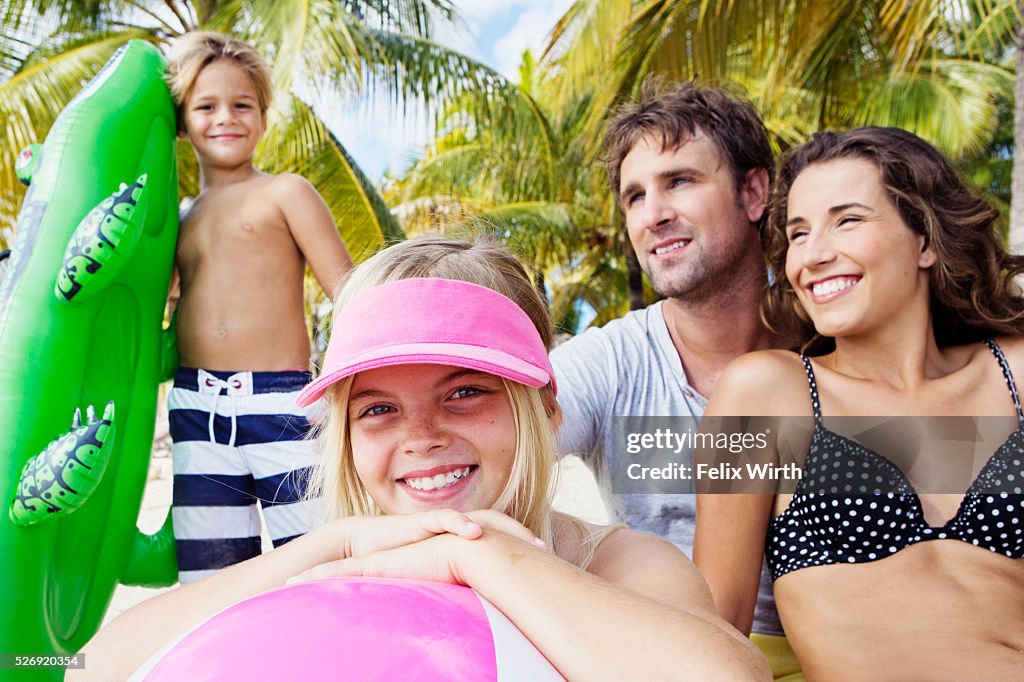 Family on beach on summer day