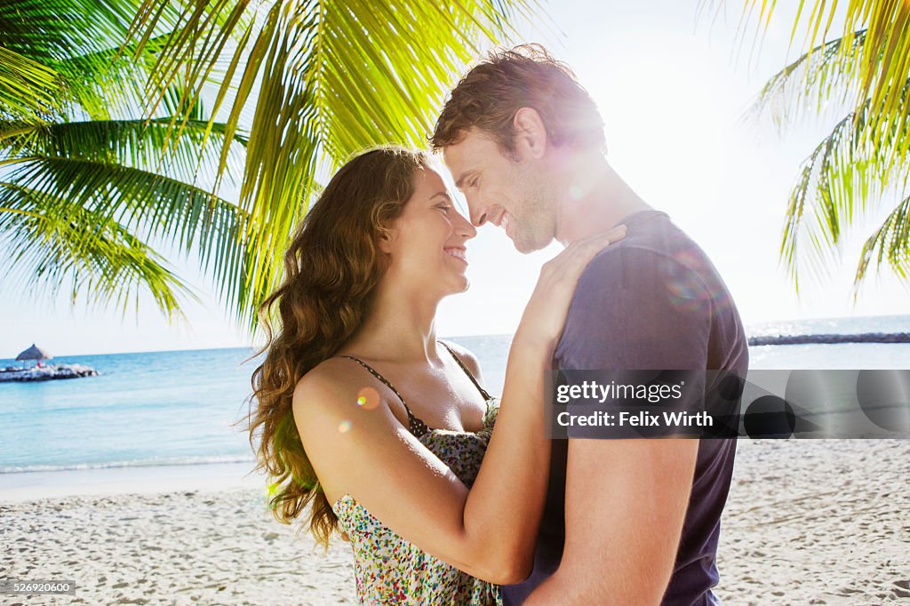 Couple embracing on beach