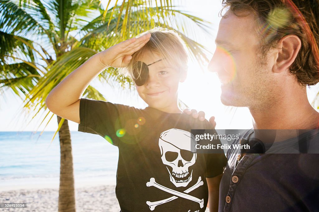 Father with son (8-9) dressed as pirate