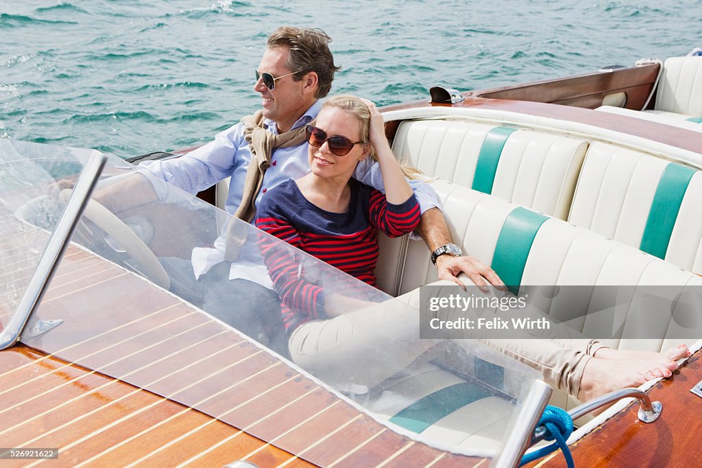 Couple on motorboat trip