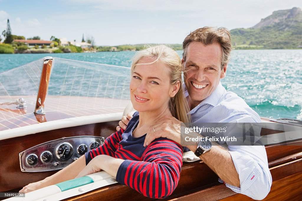 Couple on motorboat trip