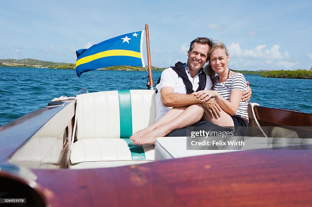 Couple on motorboat trip