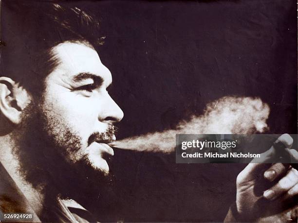 Poster portrait of Che Guevara smoking a cigar