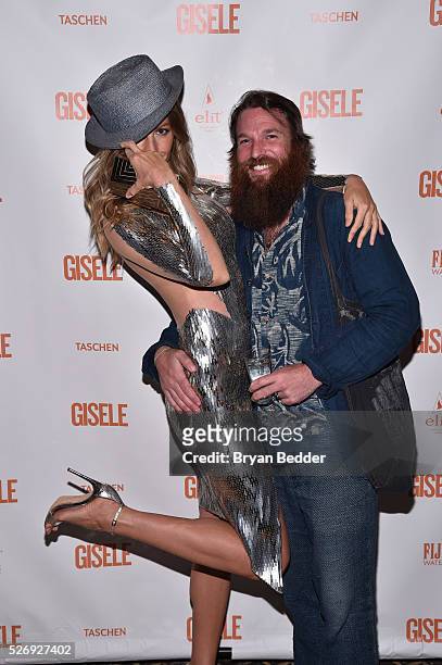 Gisele Bundchen and hair stylist attend the Gisele Bundchen Spring Fling book launch on April 30, 2016 in New York City.