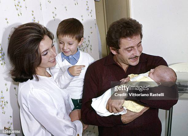 Italian singer, songwriter and actor Domenico Modugno at his home in Rome, with his wife Franca Gandolfi and their sons Marcello and Marco, born a...