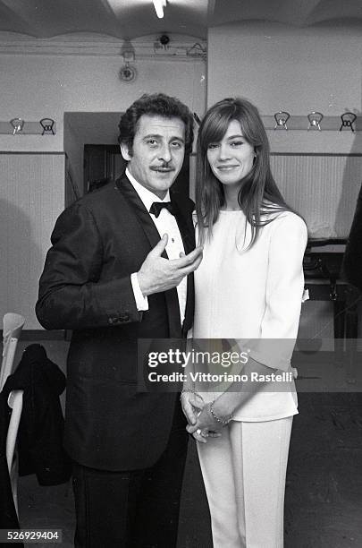 Italian singer, songwriter and actor Domenico Modugno and French singer, songwriter and actress Francoise Hardy attend the Sanremo Music Festival.