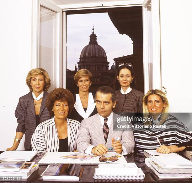 German Creative Director for Fur and Women Ready-to-Wear Karl Lagerfeld, surrounded by the five Fendi sisters, heads of the Fendi Italian luxury...