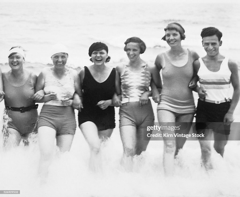 Men and women in the surf in Germany, ca. 1935.