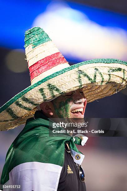 Mexico National Soccer fan is all smiles under a sombrero that says Viva Mexico after their win over Costa Rico during the Soccer, 2015 CONCAAF Gold...