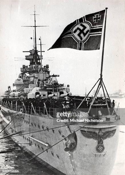 Deutchland class cruiser of the German Kriegsmarine flying a nazi standard with Nazi insignia on the prow. Source of image: KGB archive Ukraine 2010....