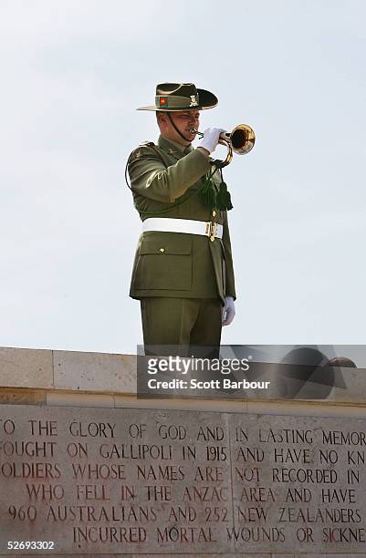 Bugler plays during the Australian ceremony at the Lone Pine Monument to mark the 90th anniversary of the landing of soldiers on the beaches of...