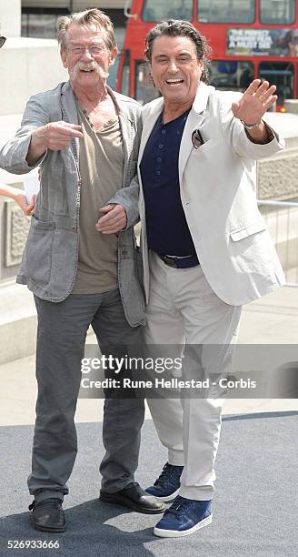Ian McShane and John Hurt attend a photo call for "Hercules" at Trafalgar Square.
