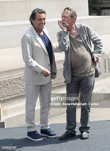Ian McShane and John Hurt attend a photo call for "Hercules" at Trafalgar Square.