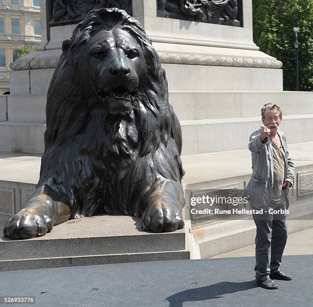 John Hurt attends a photo call for "Hercules" at Trafalgar Square.