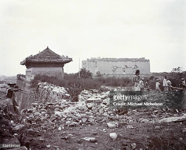Damage to the wall of Beijing caused by the Boxers in their attack on the foreign legations in the capitol.