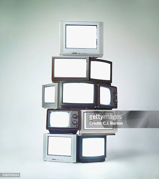 stack of televisions - catasta foto e immagini stock