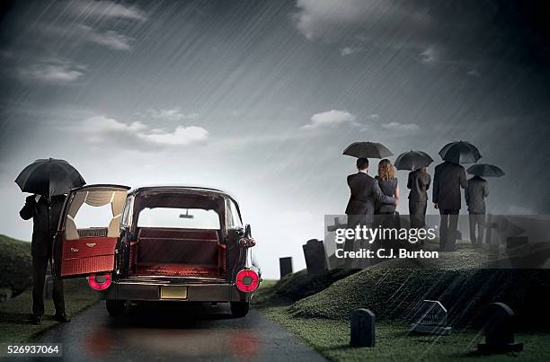 funeral in rain - hearse foto e immagini stock