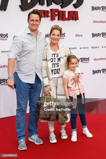 Sven Wedig and Maria Wedig with their daughter Leni Wedig attend the Berlin premiere of the film 'Angry Birds - Der Film' at CineStar on May 1, 2016...