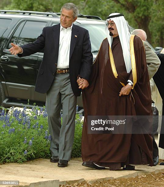 President George W. Bush escorts Saudi Crown Prince Abdullah to his private office on his ranch April 25, 2005 in Crawford, Texas. The leaders are...