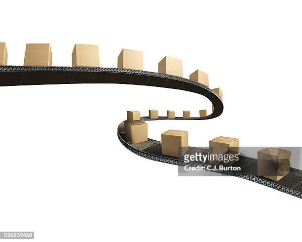 packages on a conveyor belt - conveyer belt stockfoto's en -beelden