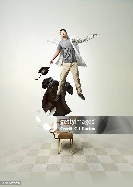 graduate - graduation gown stock pictures, royalty-free photos & images