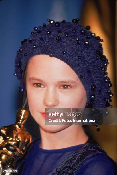 Canadian-born actress Anna Paquin poses with the 1993 Oscar she received for best supporting actress at the 66th annual Academy Awards held at the...