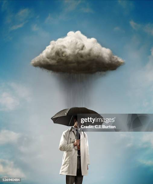 doctor under raincloud - man mistake stock pictures, royalty-free photos & images