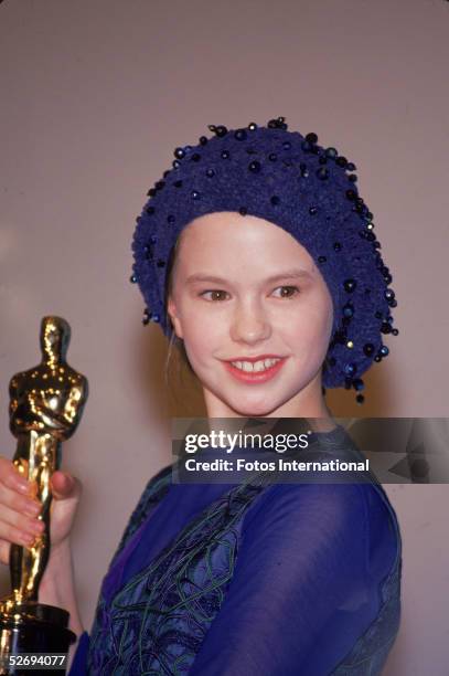 Canadian-born actress Anna Paquin poses with the 1993 Oscar she received for best supporting actress at the 66th annual Academy Awards held at the...