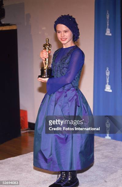 Canadian-born actress Anna Paquin poses with the 1993 Oscar she received for best supporting actress at the 66th annual Academy Awards held at the...