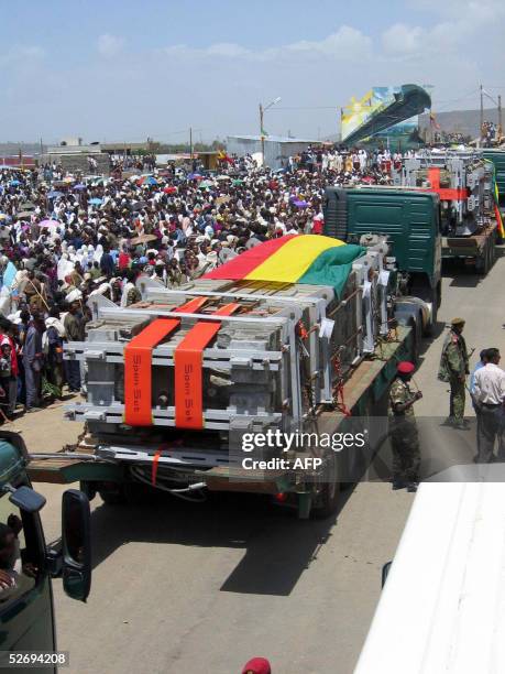 An Ethiopian truck carries 25 April 2005 the third and final piece the obelisk in the streets in the the nothern town of Axum. Ethiopia's long and...