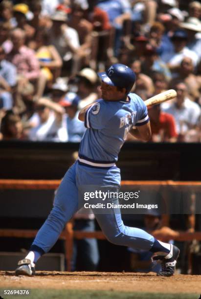 Third baseman George Brett of the Kansas City Royals swings at a pitch during a game in June, 1982 against the California Angels at Anaheim Stadium...