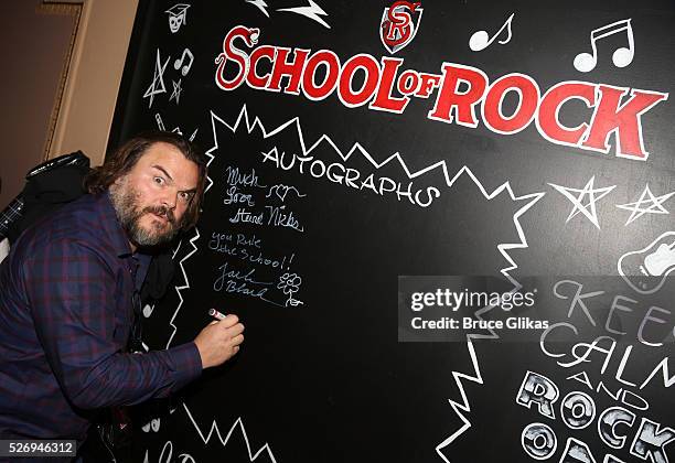Jack Black signs the VIP room wall backstage at the hit musical based on the film starring Jack Black "School of Rock" on Broadway at The Winter...