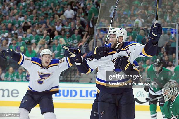 David Backes of the St. Louis Blues and Vladimir Tarasenko of the St. Louis Blues celebrate after Backes scored the game winning goal against Antti...