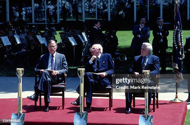 McLean, Virginia. 5-24-1984 Left to right Vice President George H.W. Bush William Casey Admiral Stansfield Turner at the grounding breaking ceremony...