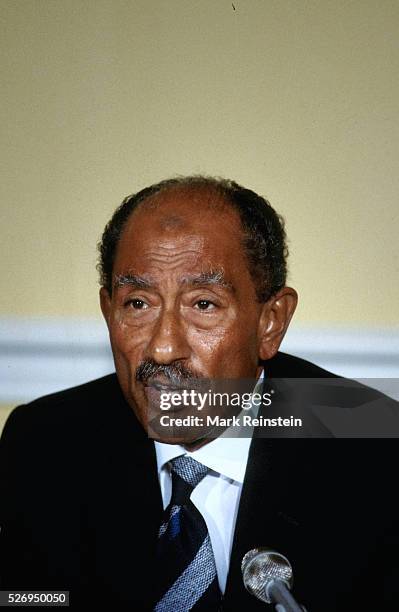 Washington, DC. 8-6-1981 Anwar Sadat President of Egypt talks with reporters in the Blair House dining room during his offical state visit to the...