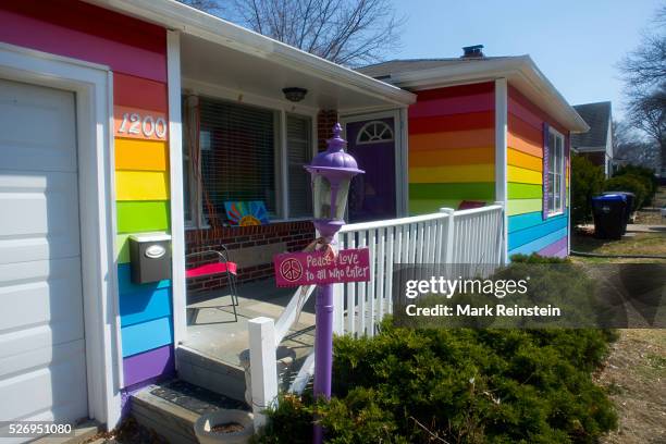 Topeka, Kansas 3-30-2014 The Rainbow House Topeka Kansas. Aaron Jackson, one of the founders of Planting Peace, a multi-pronged charity that has in...