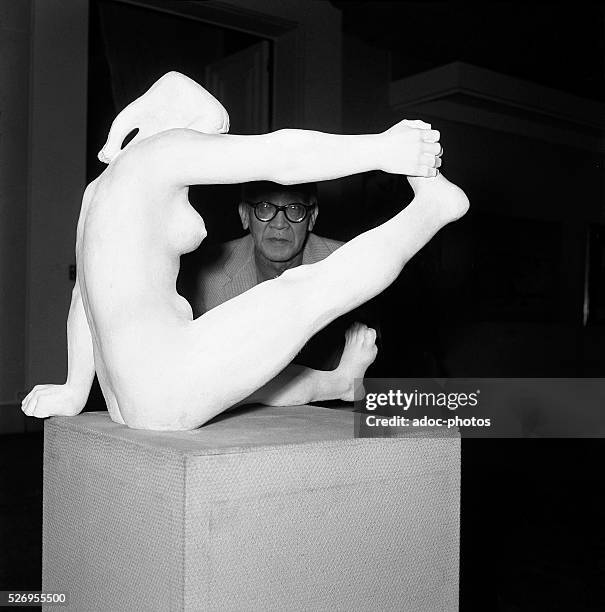 Tsugouharu Foujita at the Galliera Museum in Paris . In 1957.