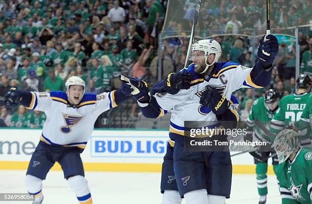 David Backes of the St. Louis Blues and Vladimir Tarasenko of the St. Louis Blues celebrate after Backes scored the game winning goal against Antti...