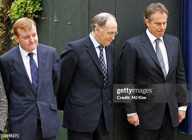 Liberal Democrat leader Charles Kennedy, Conservative leader Michael Howard, and Prime Minister Tony Blair attend the unveiling of the National...