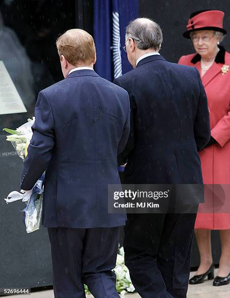 Queen Elizabeth II , Conservative leader Michael Howard and Liberal Democrat leader Charles Kennedy attend the unveiling of the National Police...