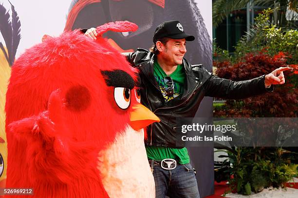 Sascha Vollmer, a band-member of 'The BossHoss' attend the Berlin premiere of the film 'Angry Birds - Der Film' at CineStar on May 1, 2016 in Berlin,...