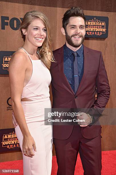 Singer Thomas Rhett and guest attend the 2016 American Country Countdown Awards at The Forum on May 1, 2016 in Inglewood, California.