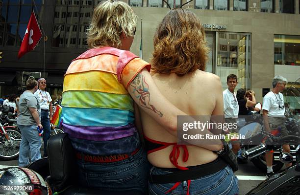 Lesbian couple wait on their bike, for the start of 35th Annual Lesbian, Gay, Bisexual, Transgender Pride March. Thousands lined the streets of...