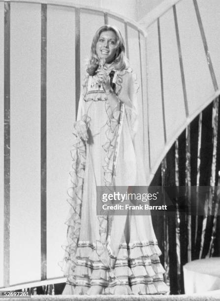 Contestant Olivia Newton-John performs 'Long Live Love' during the final dress rehearsal for the Eurovision Song Contest at the Dome, Brighton, 6th...