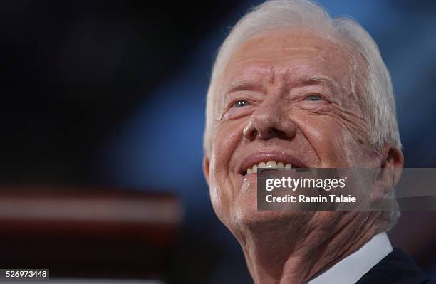 Former president Jimmy Carter addresses the delegates on the first day of the Democratic National Convention at the Fleet Center in Boston.