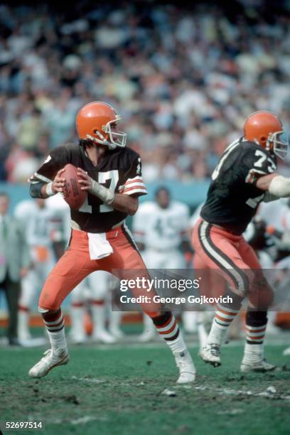 Quarterback Brian Sipe of the Cleveland Browns drops back to pass during a game at Municipal Stadium in October 1979 in Cleveland, Ohio.