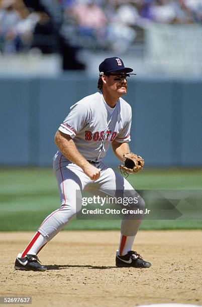 Wade Boggs of the Boston Red Sox fields during an MLB game against the Oakland A's circa 1991 at the Oakland Alameda County Stadium in Oakland,...