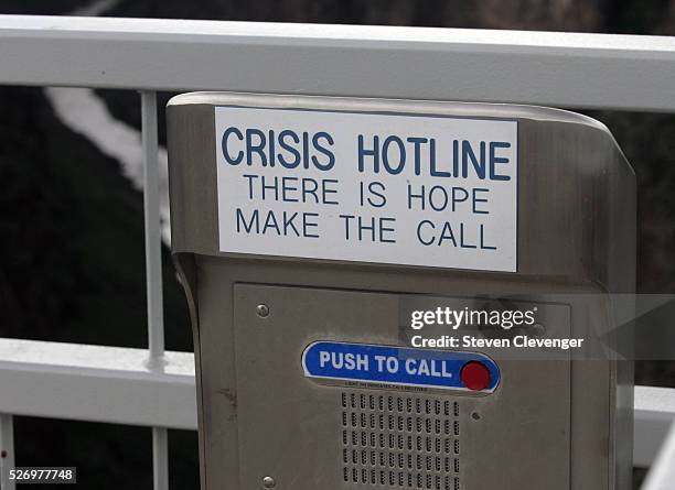 One of two crisis hotlines installed on the Rio Grande Bridge. The bridge located near Taos, New Mexico is stands approximately 650 feet above the...